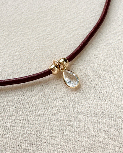 emma necklace on burgundy leather cord with gold-filled details — gemstone pendant