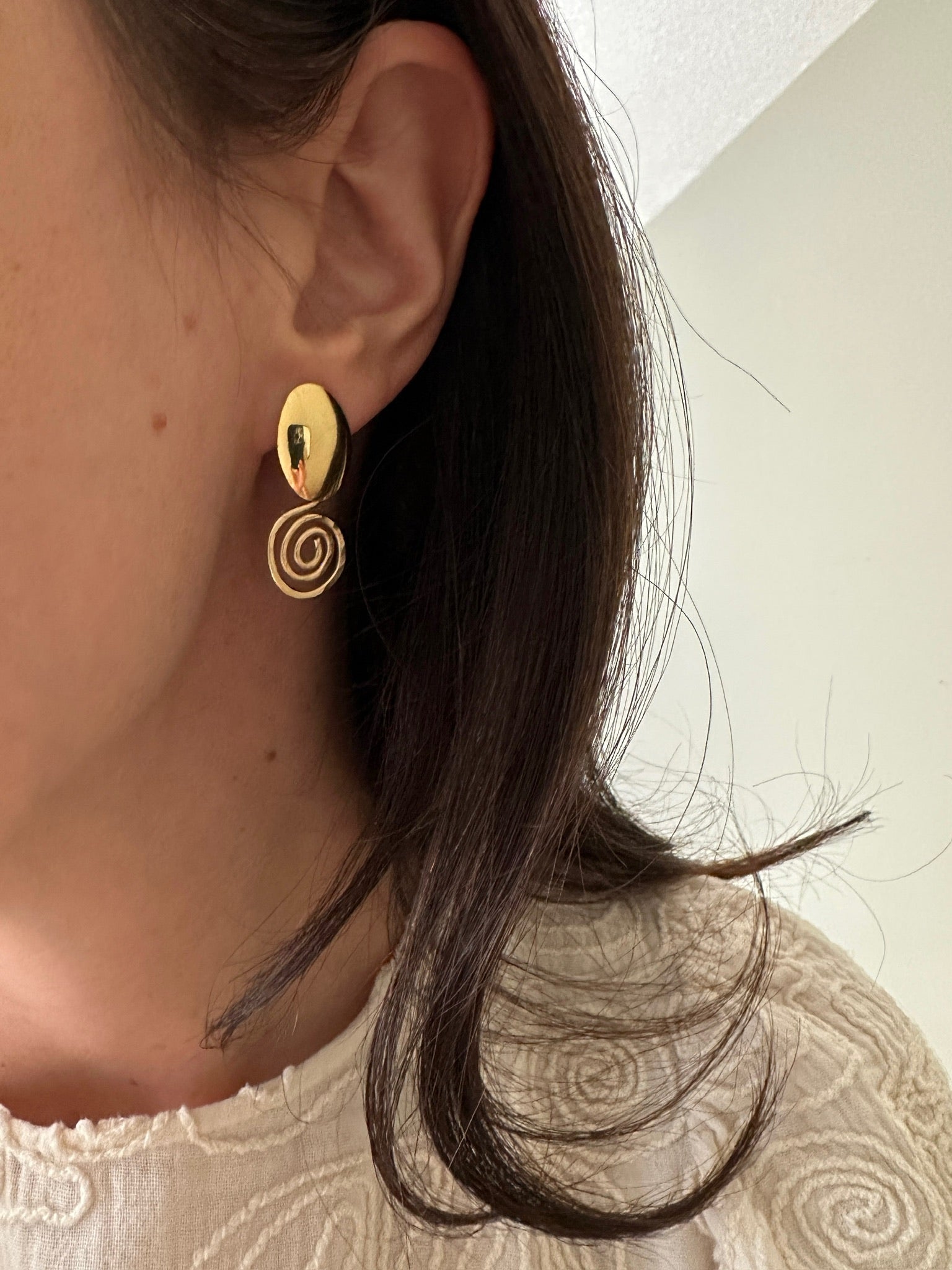 Gold filled sculptural spiral earrings by Standing O with matching spiral top